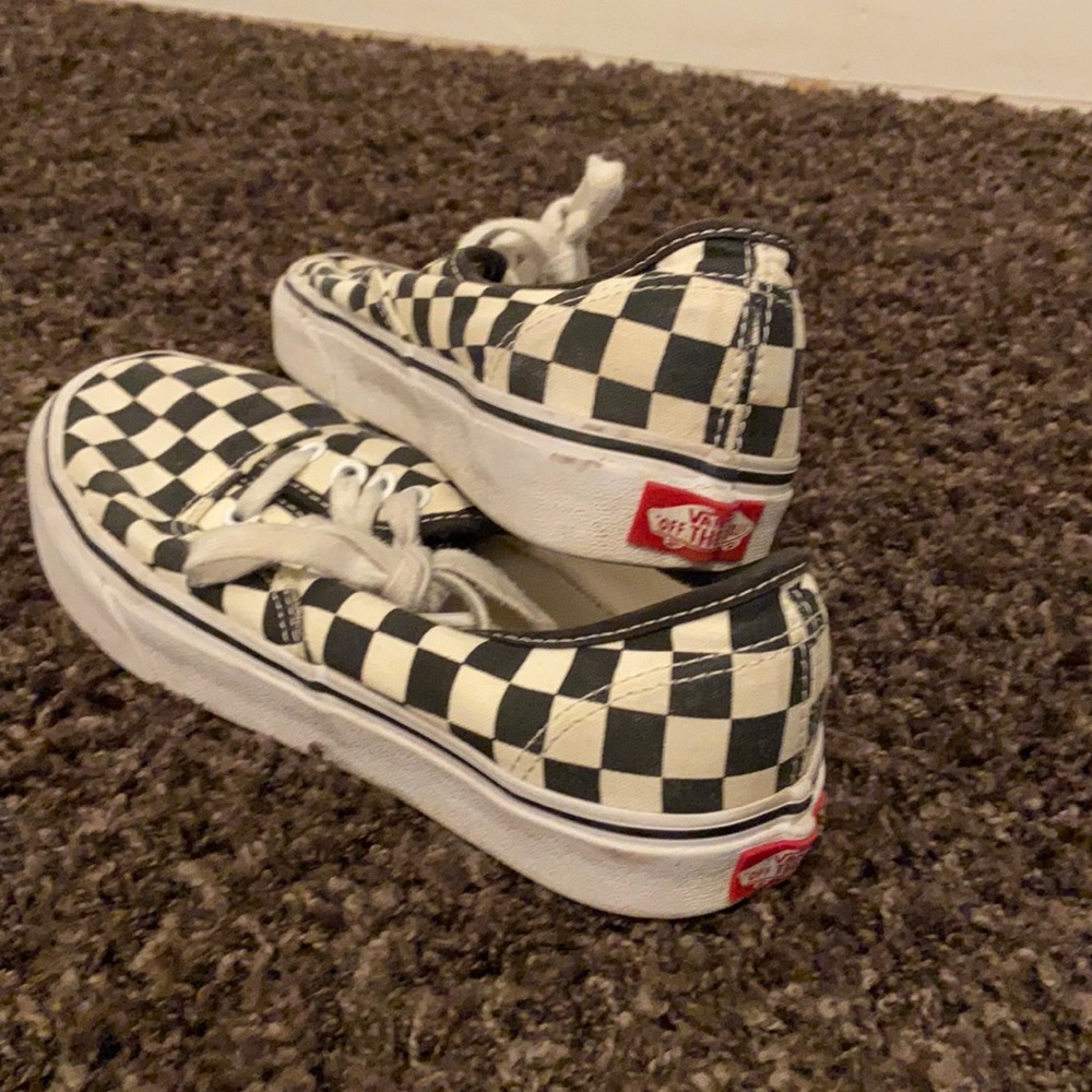 Black and off white lace up checkered Vans